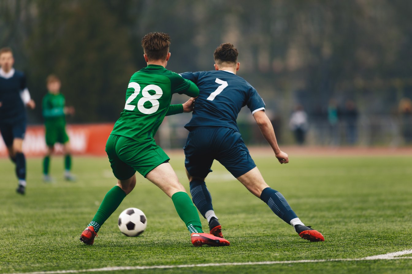 Two College Soccer Teams Playing Soccer League Game. Adult Socce